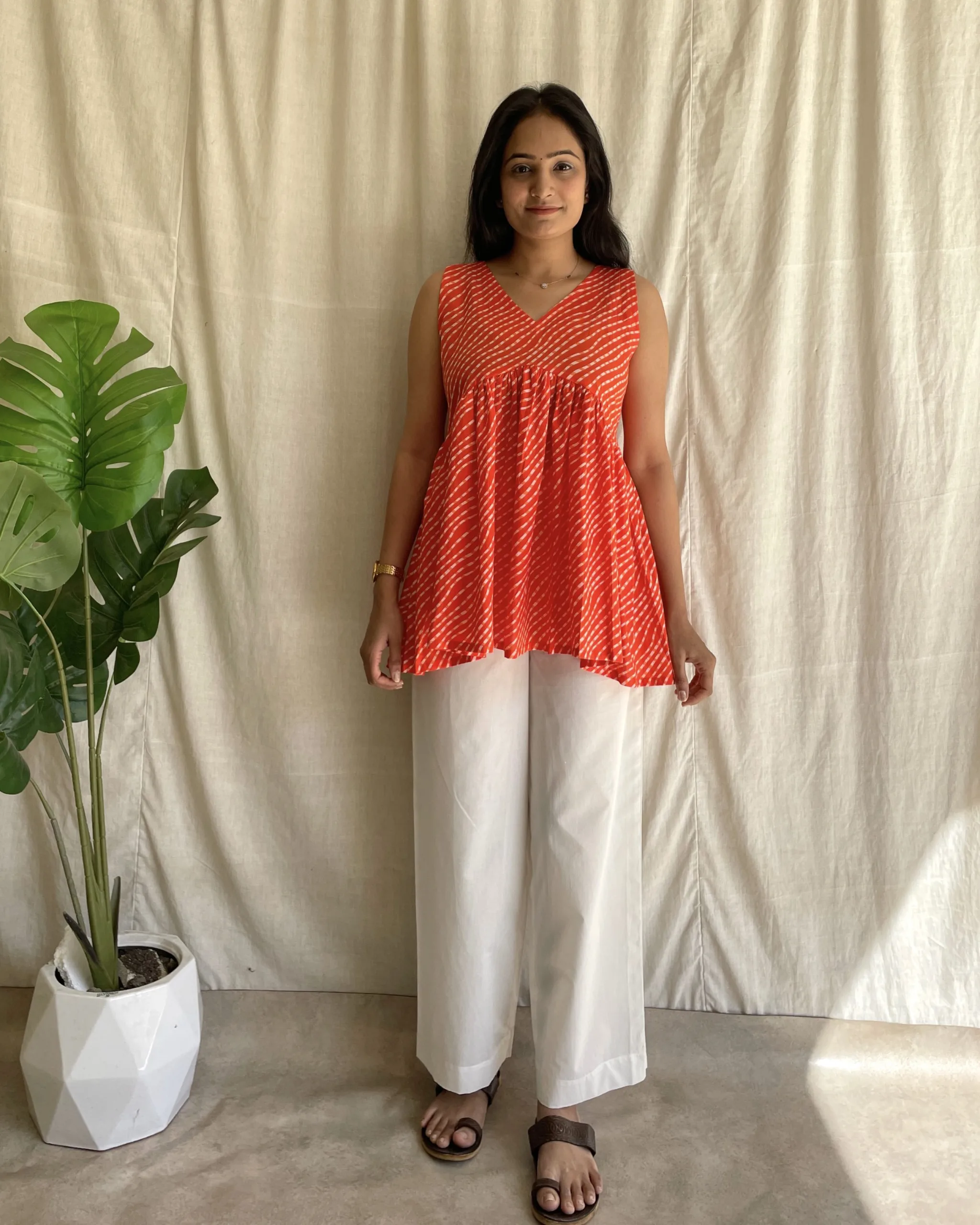 Orange cotton leheriya print peplum set