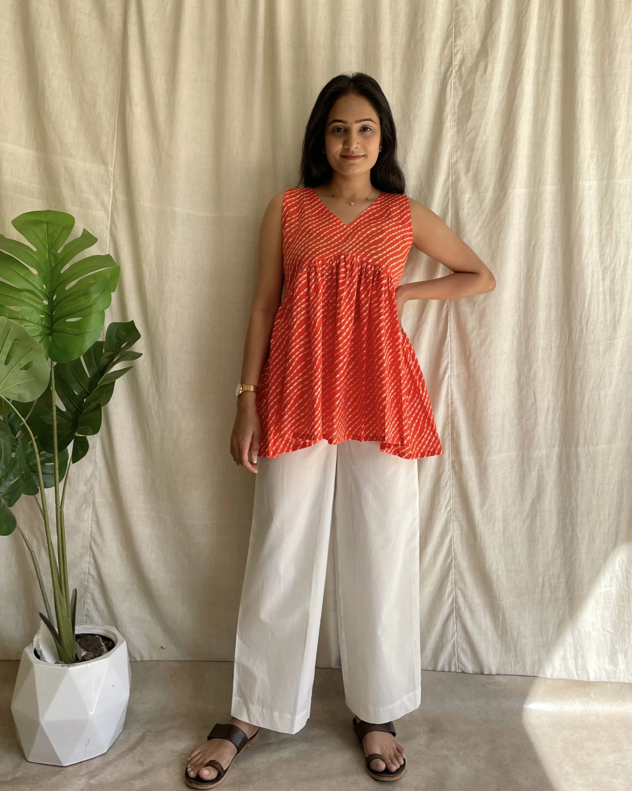 Orange cotton leheriya print peplum set